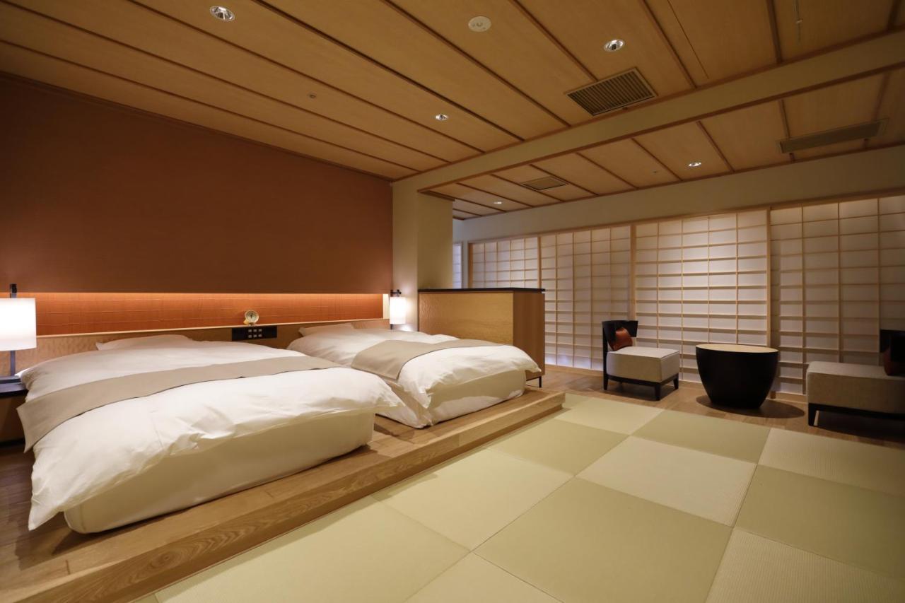Oku Yugawara Sansuirou Hotel Buitenkant foto